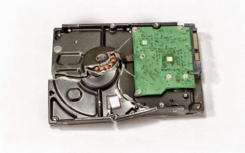 a failed hard drive with a large crack through the casing